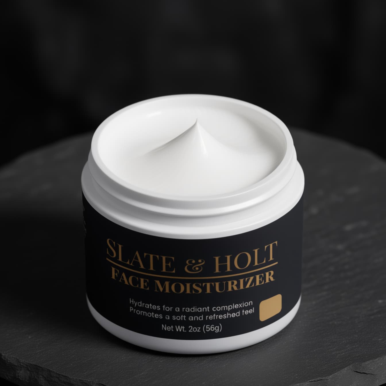 Jar of Slate & Holt face moisturizer on a dark background