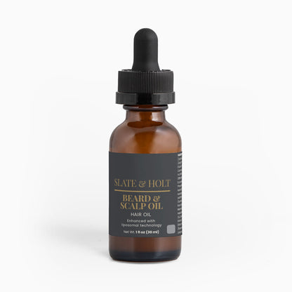 Brown bottle of beard and scalp oil with a dark label featuring the brand 'Slate & Holt' on a white background