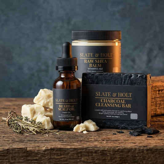 Collection of Slate & Holt skincare products on a wooden surface with a dark background